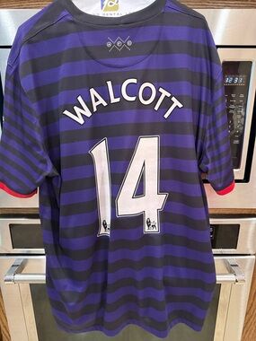 SOLD Authentic Walcott 14 Men's Purple & Black Striped Football Jersey